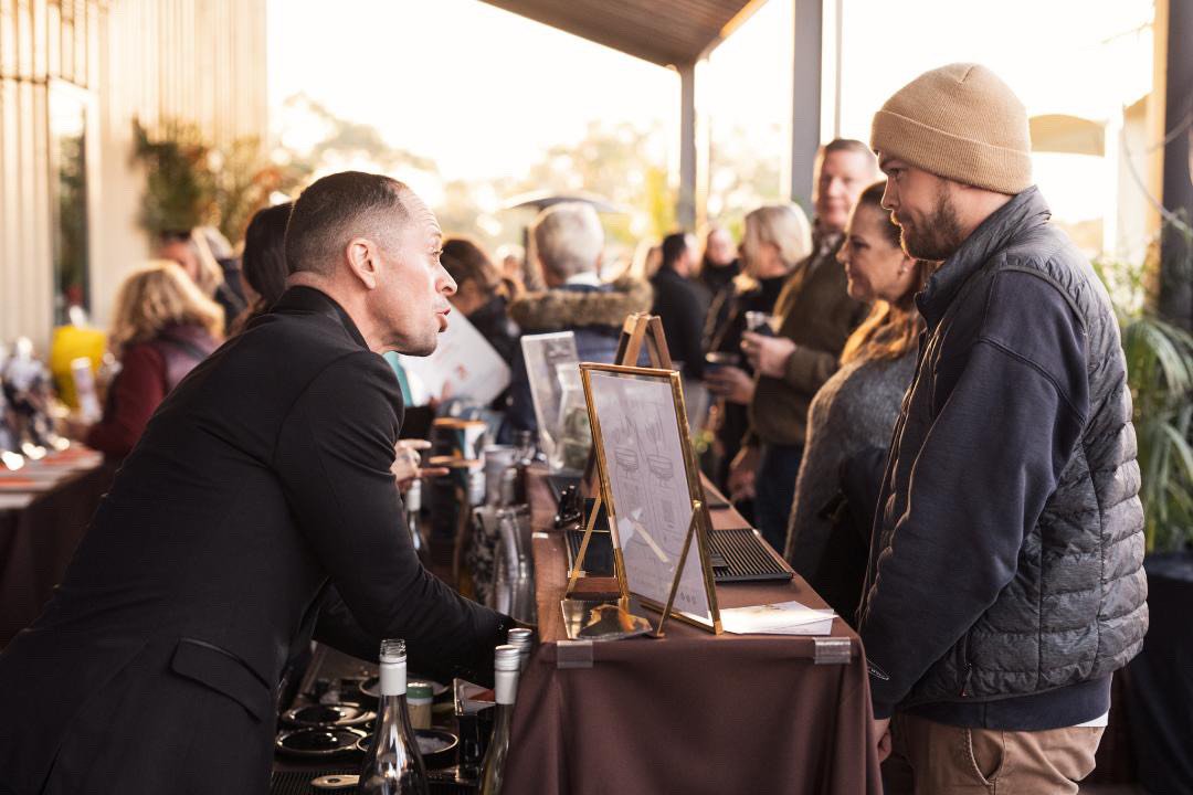 Guests gathered at the Wild Bloom bar during an event